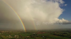 'Ray of hope': Beautiful drone footage captures double rainbow over locked down UK