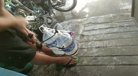 Kind neighbour makes DIY sanitiser sprayer to cleanse street during Covid-19 lockdown