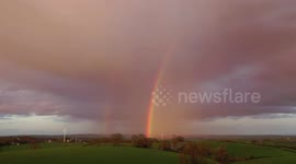 Drone Captures Pink Sunset Rainbow
