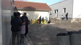 FILE: Refugees languish in Serbian refugee camps along Europe’s borders