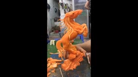 Professional sculptor in Vietnam beautifully crafts carrots into a horse
