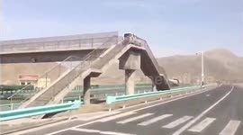 Chinese motorist drives over pedestrian overpass to make U-turn