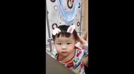Apparently this toddler is not a fan of bunny