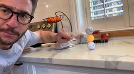 Canadian dad shows off incredible ping-pong ball and golf ball balancing trick amid coronavirus quarantine