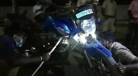 Small snake pulled out from duty-bound cop's motorcycle in southern India