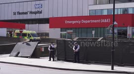 Police and media outside St Thomas's Hospital as Boring Johnson is in intensive care