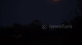 Beautiful full pink Supermoon in time-lapse footage from UK