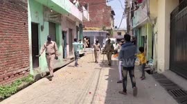 Residents show gratitude to cops by showers of flower petals for their service amid lockdown in Northern India