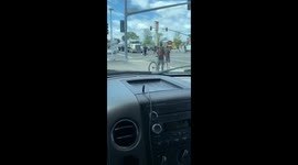 Follow up on the two men fighting in an intersection in California