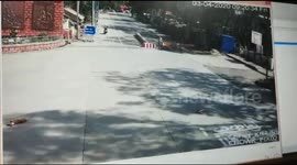 Moment speeding car smashes through police barricade defying Corona lockdown