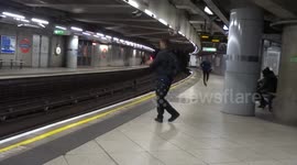 Dancing passenger spotted on the tube platform in London