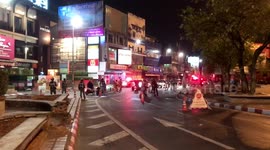 Thai police guard checkpoint to enforce nighttime coronavirus curfew