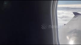 Leader of Belarus church takes to skies with precious relics