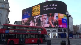 Stay Home - Protect the NHS - Save Lives message lights up Piccadilly Circus during Coronavirus lockdown - London