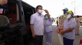 Thailand's health minister visits COVID-19 checkpoint, hospital
