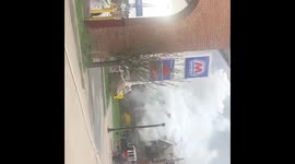This video contains a historic apartment building in the Shaker Square area burning across the street from the gas station this apartment building is located at the intersection of South Moreland and S. Woodland Ave. in Cleveland Ohio