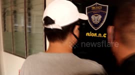 Dramatic moment alleged face mask scammer is arrested in Thailand