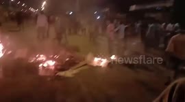 Indian migrant workers resort to violence over fears of COVID-19 lockdown extension
