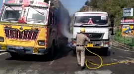 Officials use pumps to sanitise vehicles in effort to curb COVID-19 spread in northern India