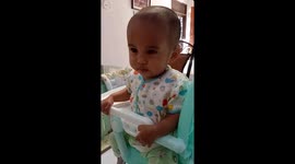Baby Nathan refusing his breakfast