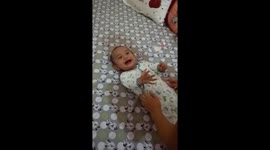 Baby Nathan laughing very hard...happy day with mommy