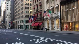 Deserted Fifth Avenue at St. Patrick's Cathedral during Covid-19 lockdown in New York City. April 11 2020