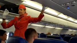 A  beautiful stewardess comment about a passanger on the plane
