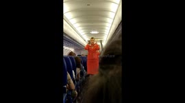 Safety Instructions on the Plane Close up pretty stewardess funny