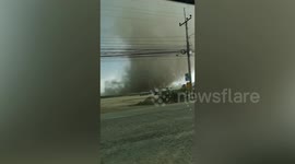 Thailand storms: Moment tornado blows over concrete posts and metal huts