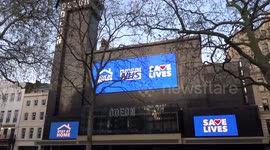 Coronavirus: police patrol Leicester Square with Odeon cinema appealing to support the NHS - London