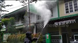 Spraying disinfectants at the Orphanage in Makassar