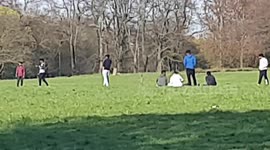 Lads play cricket in UK park defying country's COVID-19 lockdown guidelines