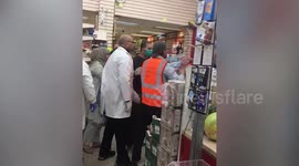 Female customer throws punches over coronavirus social distancing rules in UK supermarket