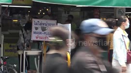 Market uses plastic sheets with window for serving food amid Covid-19 pandemic
