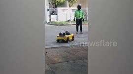 Thai resident uses remote controlled car to collect takeaway food during coronavirus pandemic