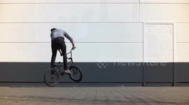 Extreme Sports: BMX Bike rider jumps 360