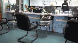 Thai police are using their riot shields as coronavirus barriers when talking to the public