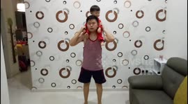 Asian dad workout with his son during coronavirus pandemic