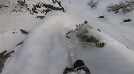 UK skier unscathed after causing miniature avalanche on Swiss cliff face