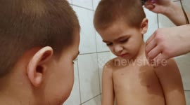 Cute kids get DIY haircut on day 25 of lockdown in Sarajevo
