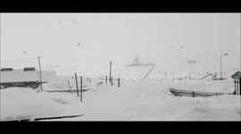 Fresh snowfall covers hillside town in Kashmir, India