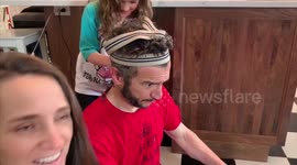 Canadian dad lets his kids cut his hair during coronavirus lockdown