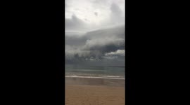 Massive storm with UFO shaped cloud approaches Australian coast