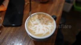 Barista in Indonesia Paint Coffee Like Coronavirus as a Form of a Survival Campaign at Home