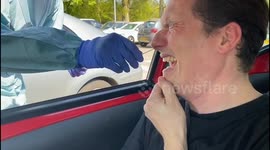 UK doctor records excruciating experience of drive-through coronavirus test
