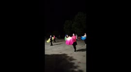 Women in central China return back to dance in park after coronavirus lockdown is eased