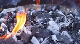 BBQ ASMR: Charcoal grill gets lit and burgers are sizzling in satisfying clip