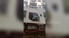 Truck smashes through second-floor flat when driver loses control in China