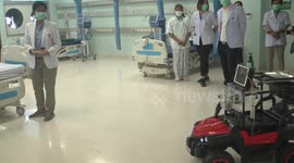 Doctors in Thailand use remote-controlled buggy to deliver medicine to COVID-19 patients