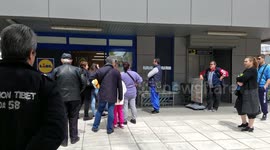 Crowds and lines outside supermarkets and churches during coronavirus lockdown in Greece